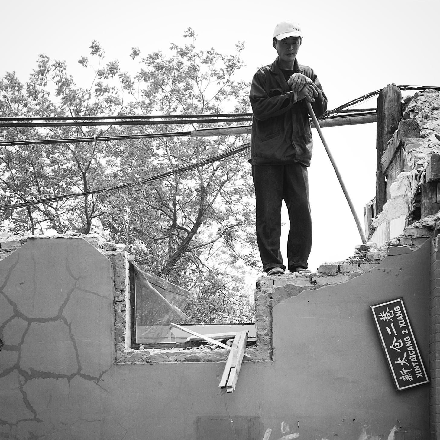 Construction worker in a Beijing hutong