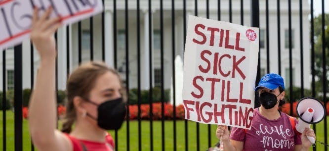 Protesters march outside the White House to call attention to the impact of long COVID, September 19, 2022.