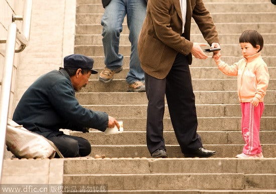 Would you give money to beggars?[1]- Chinadaily.com.cn