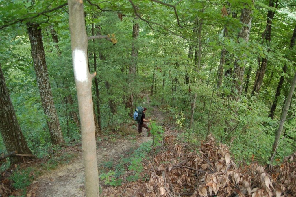 A backpacker depends down the Knobstone Trail in southern Indiana. Photo by author