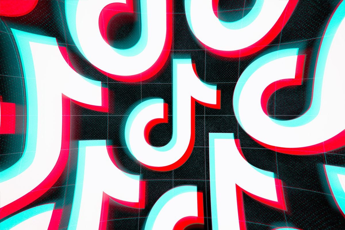 Tessellated TikTok logos against a dark background.