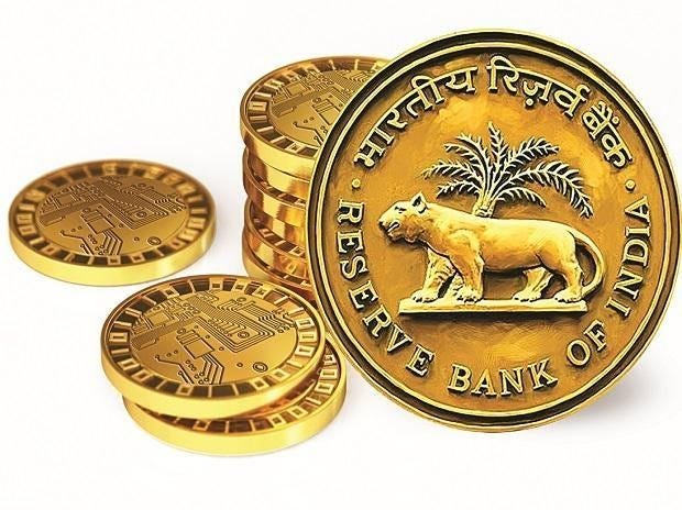 Moneda de color dorado

Descripción generada automáticamente con confianza baja