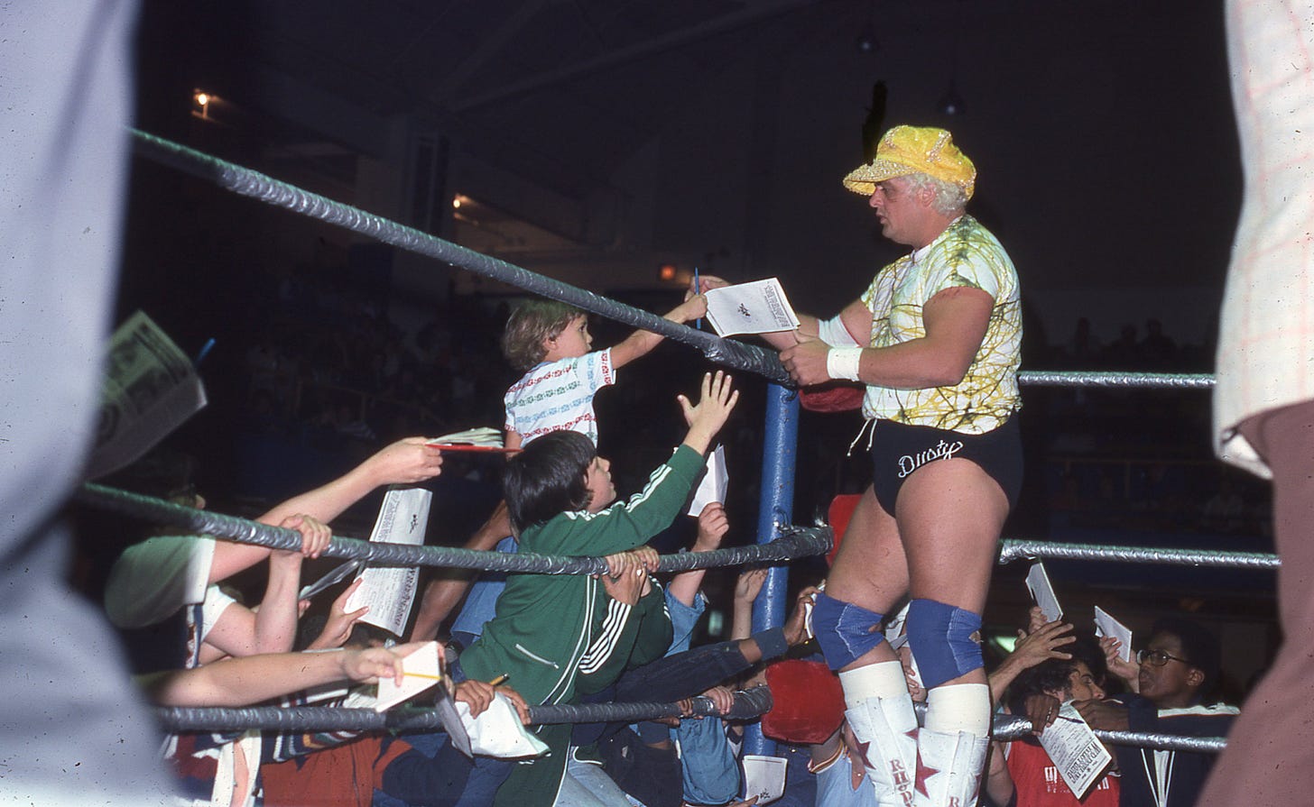 Dusty Rhodes signs autographs