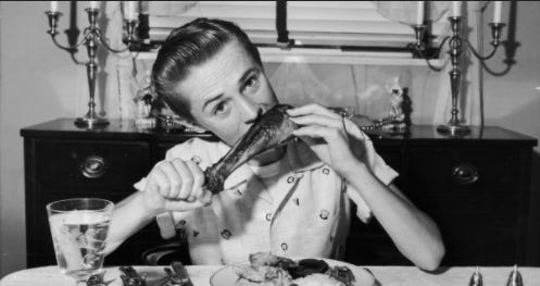 1950's girl eating poultry drumstick
