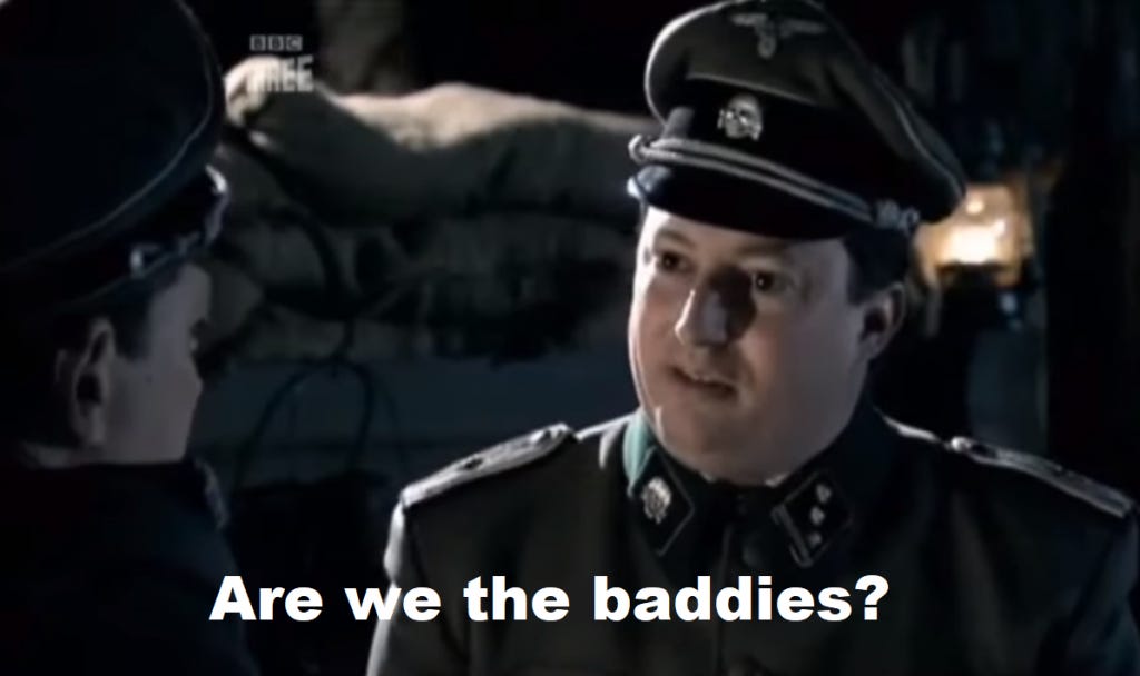 Screenshot from the comedy sketch with David Mitchell dressed as a Nazi soldier asking a fellow soldier in dawning realisation 'Are we the baddies?'
