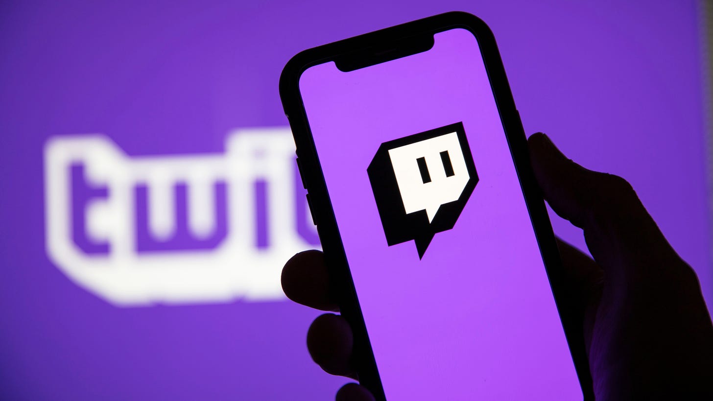 Gaming streaming service Twitch TV mobile and purple logo