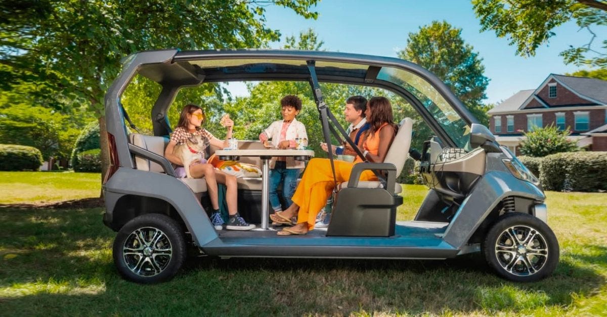 New Club Car Cru is an electric golf car with living room seating