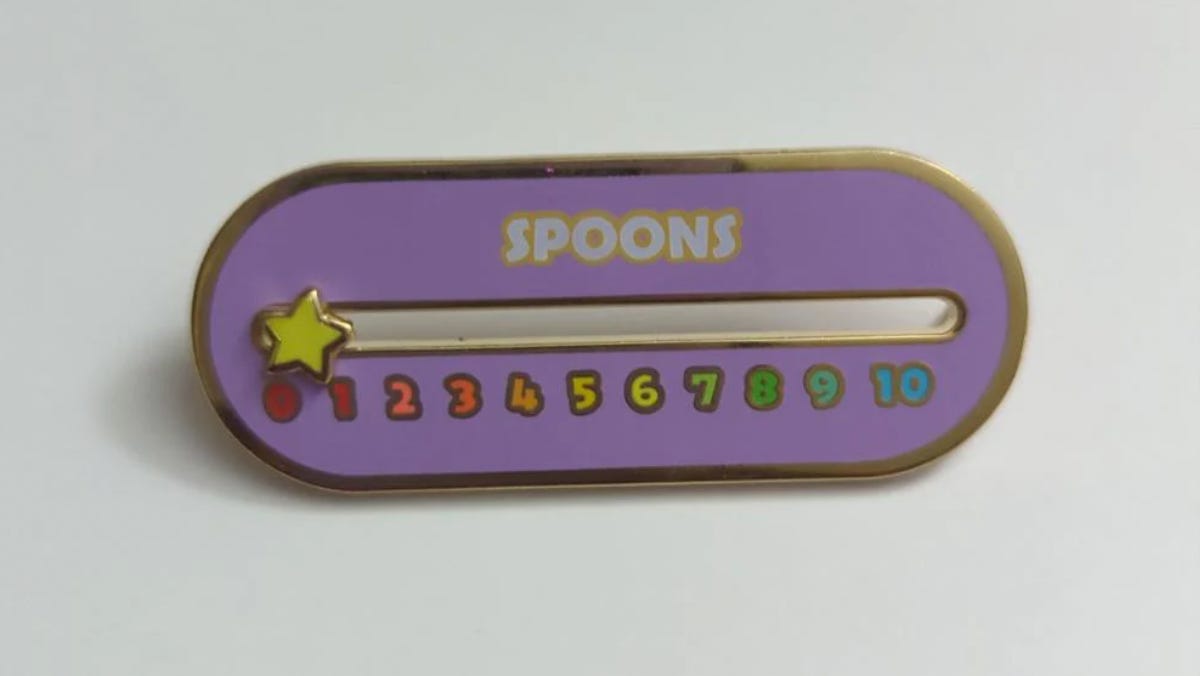 A purple pin with a colorful number scale 1-10 that you can move to indicate you level of spoons.