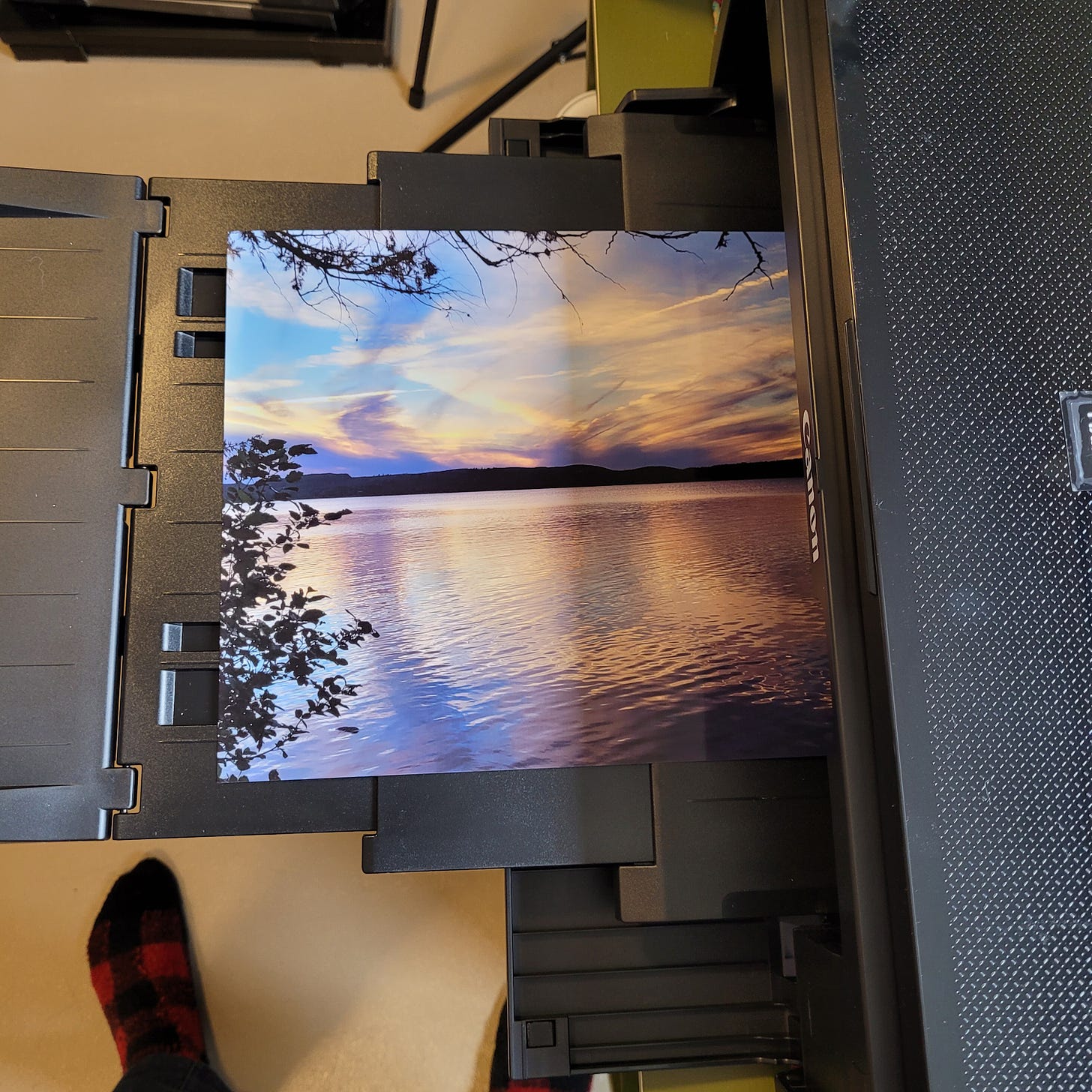 Freshly printed on my new printer: a photograph I took of the sunset over Gunflint Lake in the Boundary Waters of Minnesota. The colors are dazzling pinks, peaches, violets and blues.