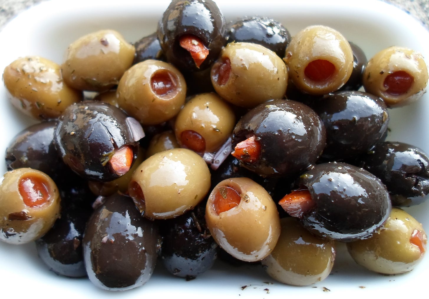 Happier Than A Pig In Mud: Marinated Almond Stuffed Olives -Appetizer or  Snack