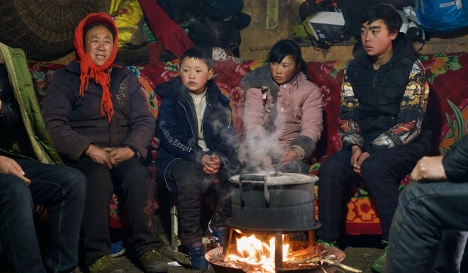 The improvished family of "Ice Boy" Wang Fuman in the southwestern province of Yunnan. There is a drastic gap in income, education level and lifestyle between the rich and the poor in China.