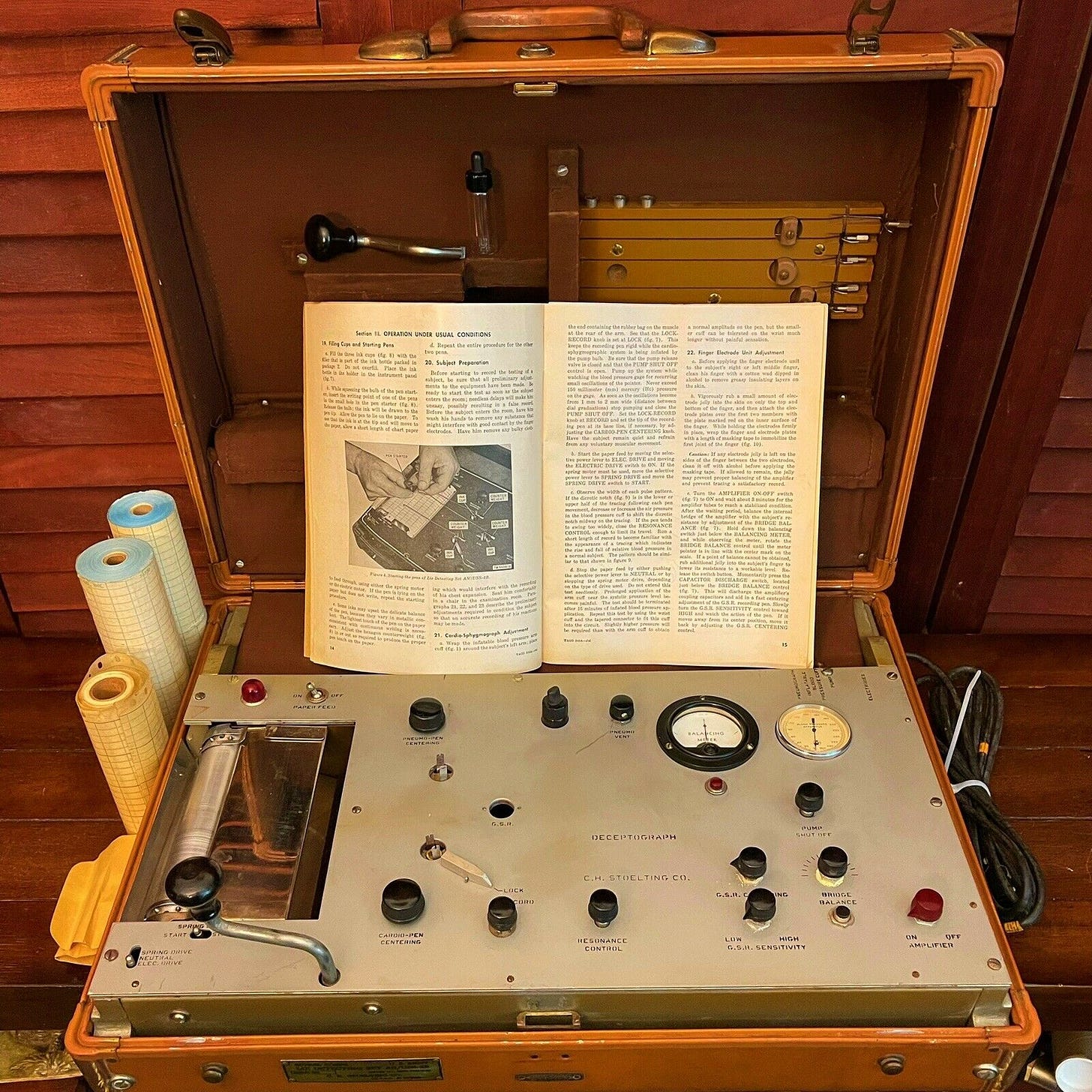 An old-time lie detector in a suitcase.