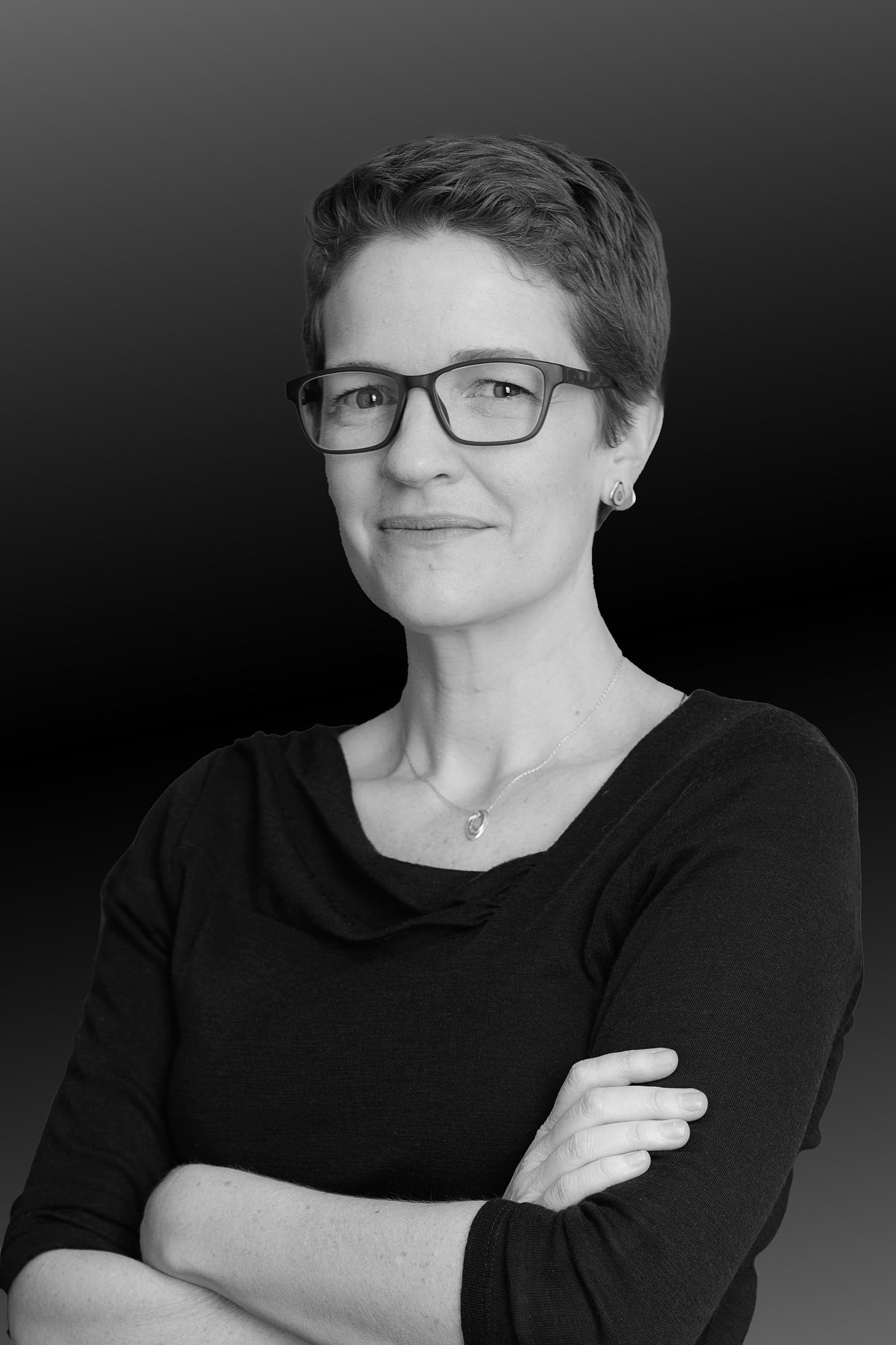 A black and white photo of author Anna Whateley