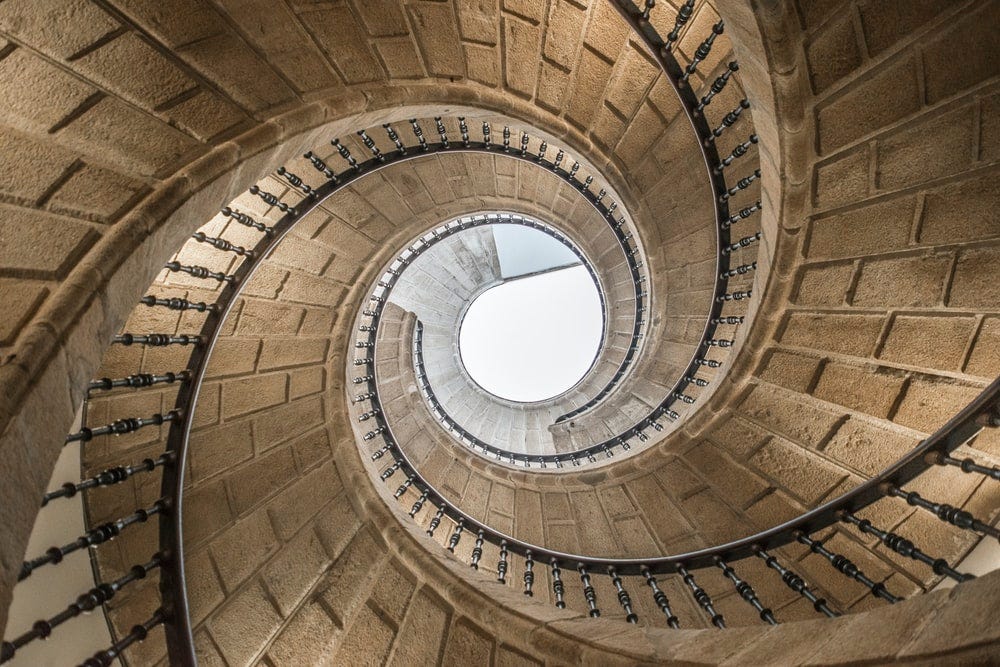 brown spiral staircase during daytime