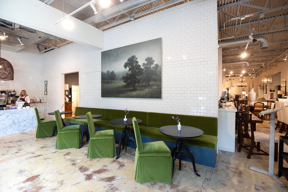 Another view of the interior of Sheep &amp; Meadow. The Holland MacRae showroom is seen on the right of the frame. The large painting on the wall is by renowned local artist  Michael Dines .