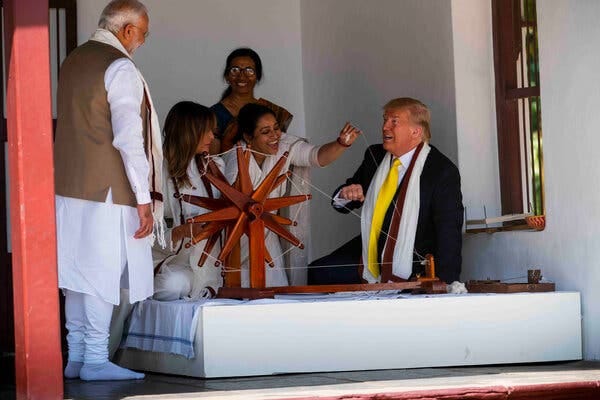 Prime Minister Narendra Modi of India with President Donald J. Trump and Melania Trump, the first lady, in 2020. Mr. Trump received a spinning wheel and other gifts on the trip.