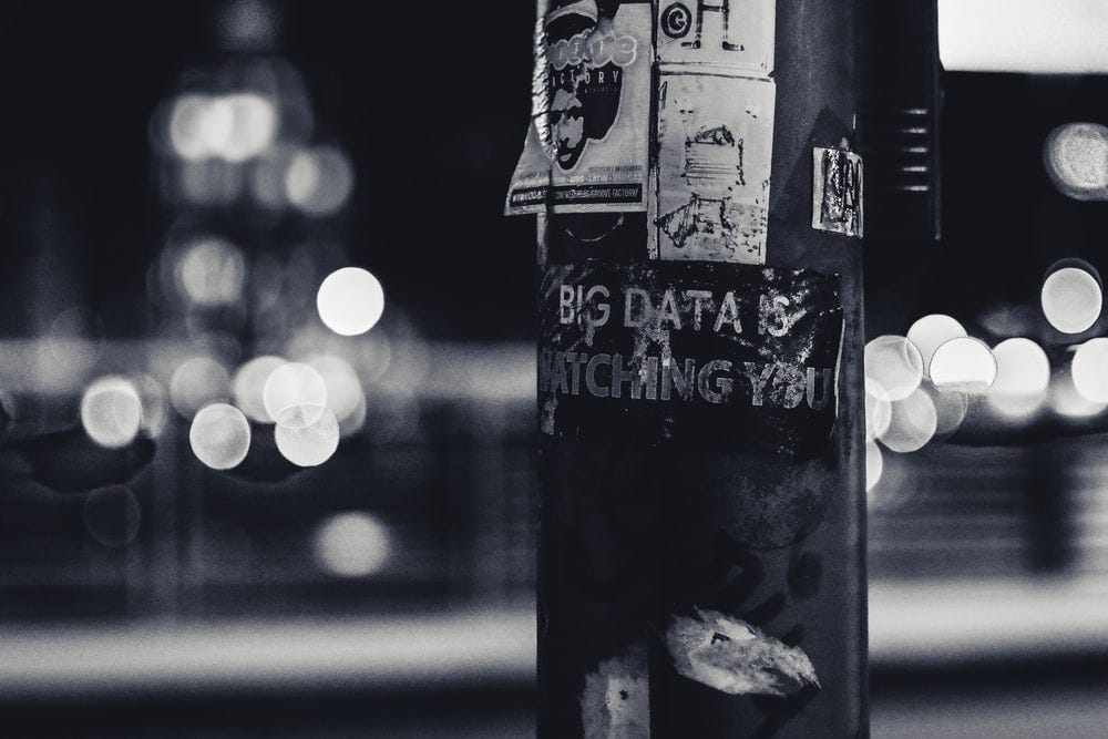 Flyer on a lampost saying 'Big data is watching you'