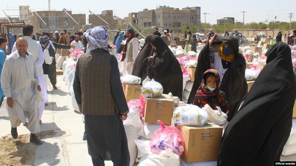 World Food Programme staff distribute food aid in Herat in August.