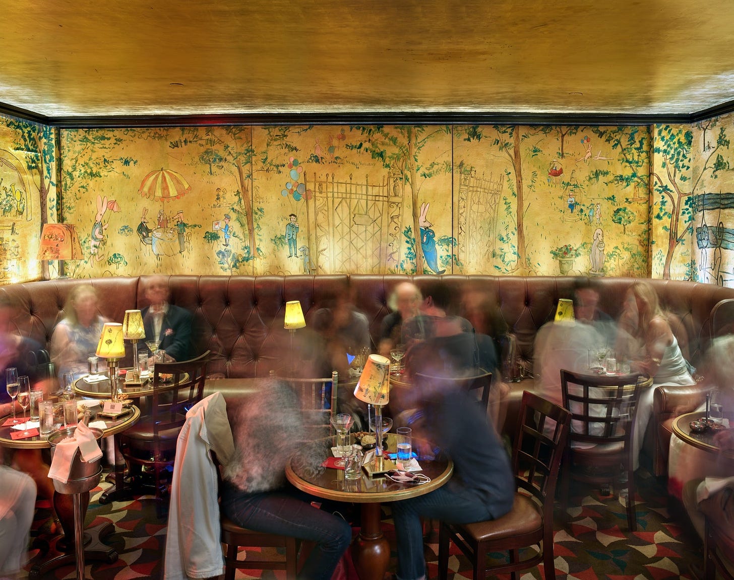 Blurry figures dining at Bemelmans Bar