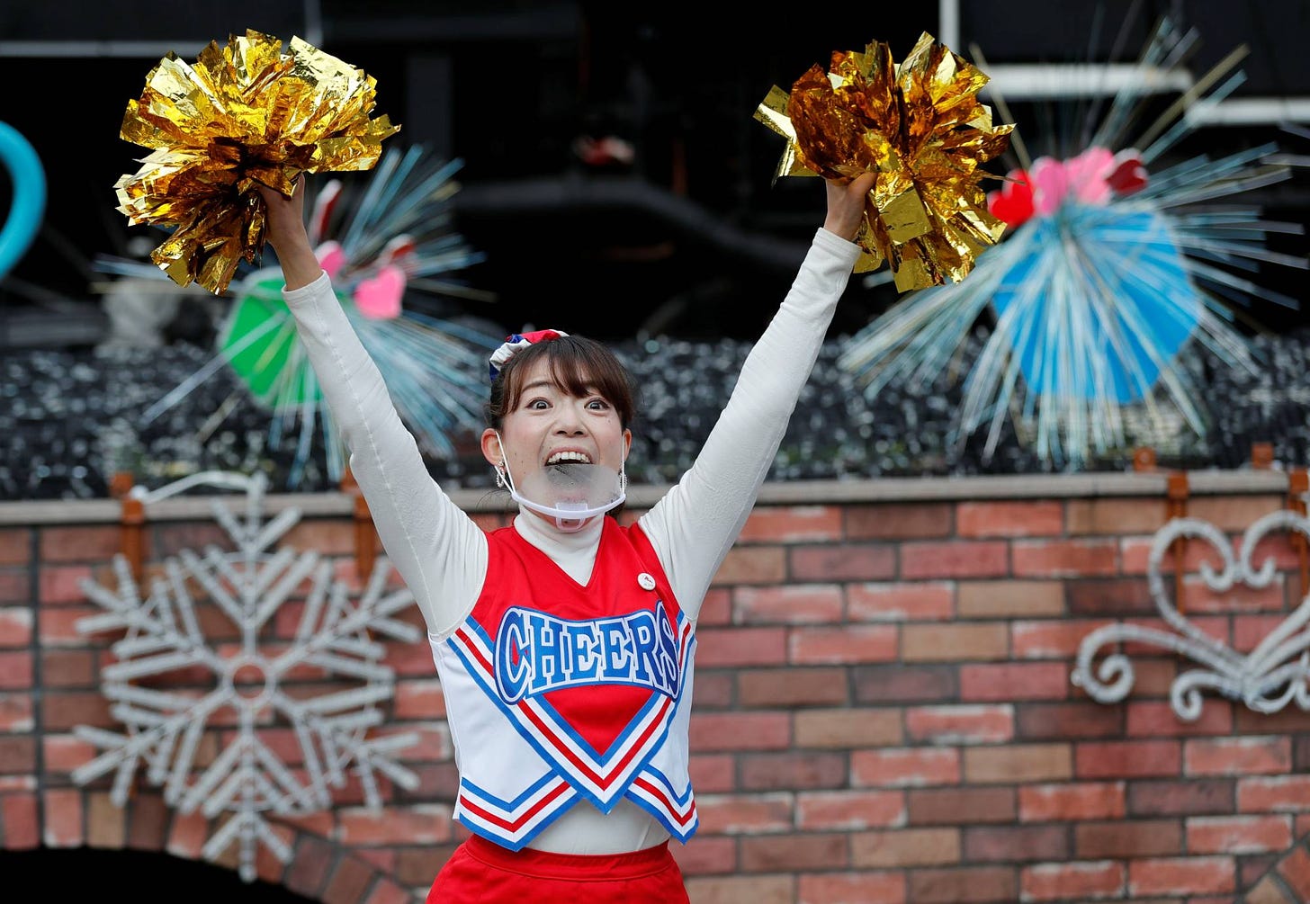Cheerleaders lift Tokyo's spirits as coronavirus cases surge | The Japan  Times