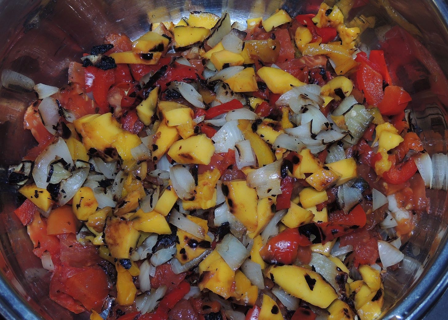diced up roasted ingredients ready to be covered in vinegar/water mixture and simmered to perfection before blending
