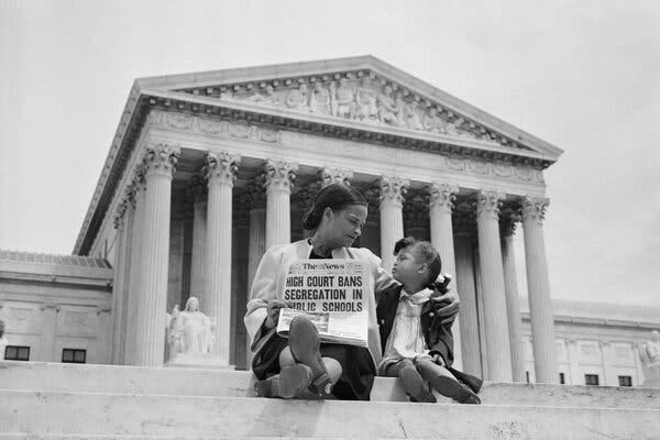 Nettie Hunt and her daughter Nickie on the steps of the Supreme Court after the Brown v. Board of Education decision in 1954.