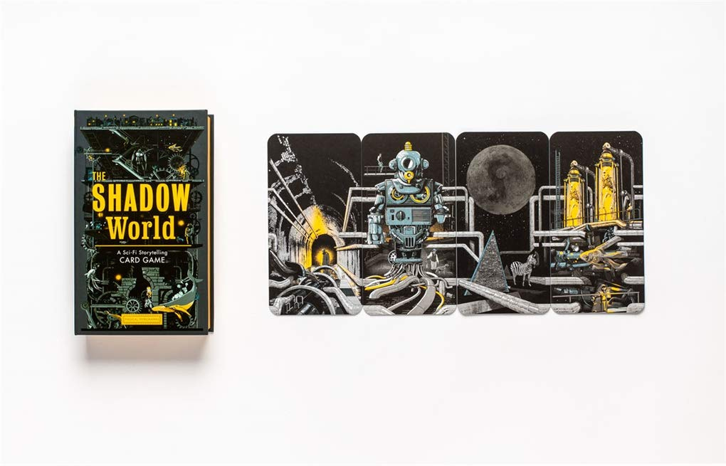 A book-shaped box with text in yellow that reads "The Shadow World: A Sci-Fi Storytelling Card Game." Next to it are four cards, lined up to make a single image. The cards are: A tunnel into nowhere, a robot connected to a series of pipes and tubes, the moon over a zebra and a pyramid in an industrial setting, and two figures in bright yellow tanks asleep while a fish swims by below them.