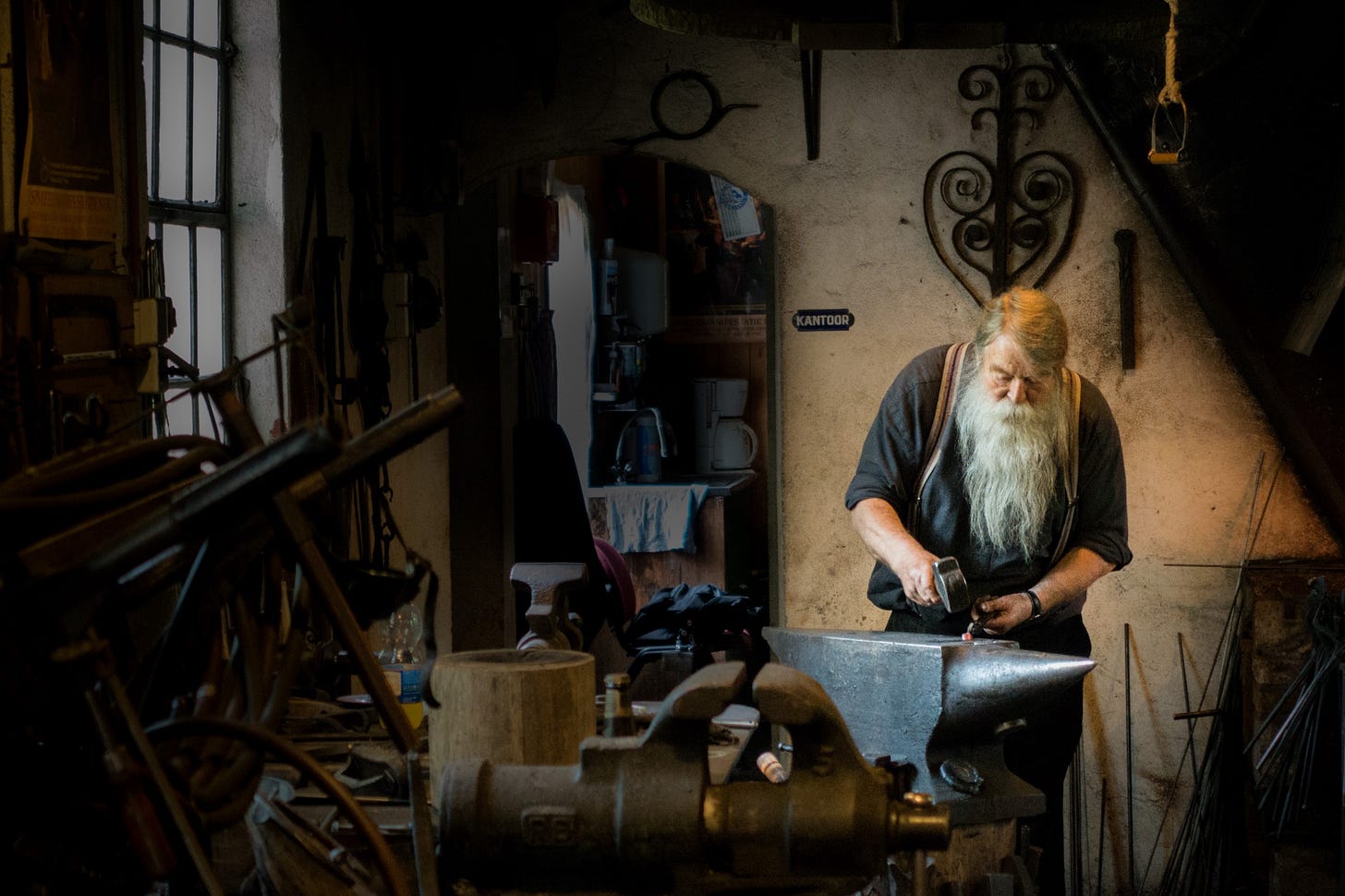 image of a craftsman at work for article by Larry G. Maguire