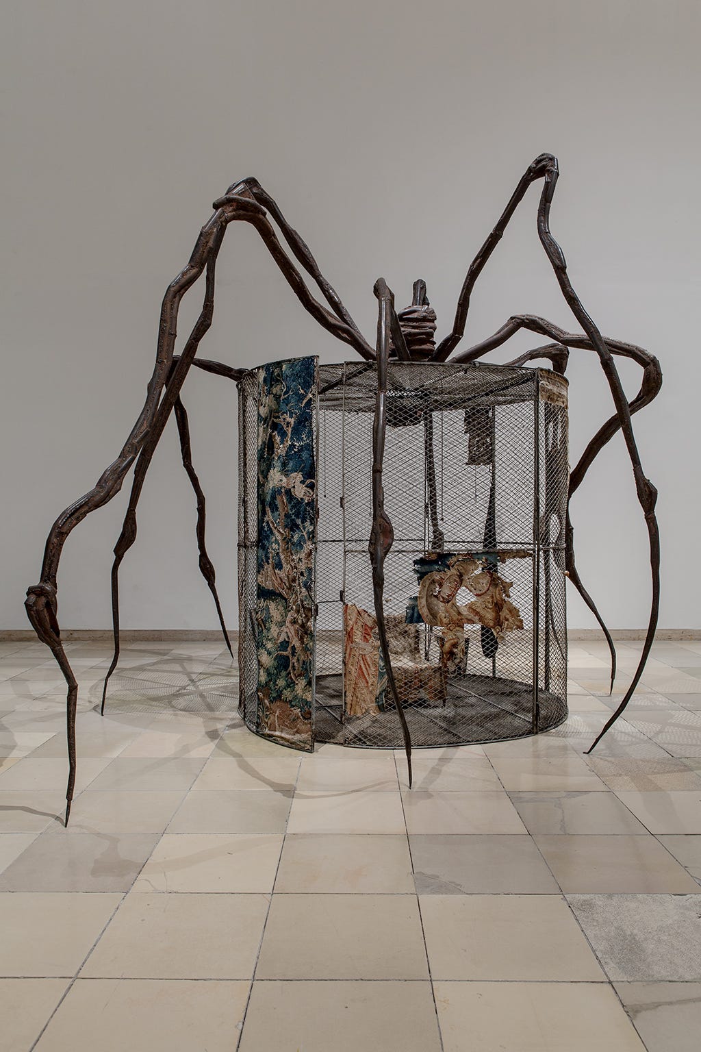 Louise Bourgeois Spider, 1997 Steel, tapestry, wood, glass, fabric, rubber, silver, gold and bone 449.6 x 665.5 x 518.2 cm.