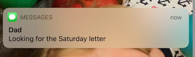 Screenshot of a text message from "Dad": "Looking for the Saturday letter"