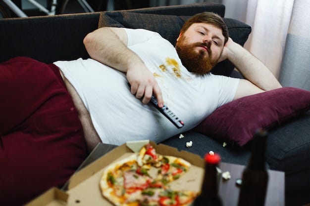 Image result from https://www.freepik.com/free-photo/sad-fat-man-lies-sofa-watches-tv_2446938.htm