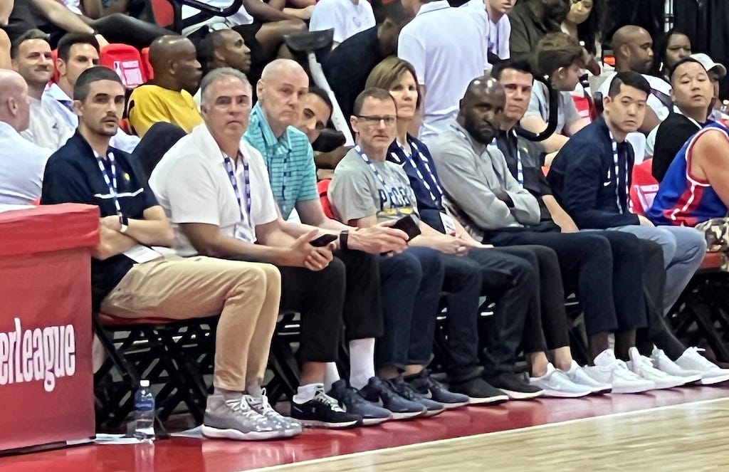 Kevin Pritchard, Rick Carlisle, owner Steve Simon and the rest of the Pacers’ front office at a summer league game.