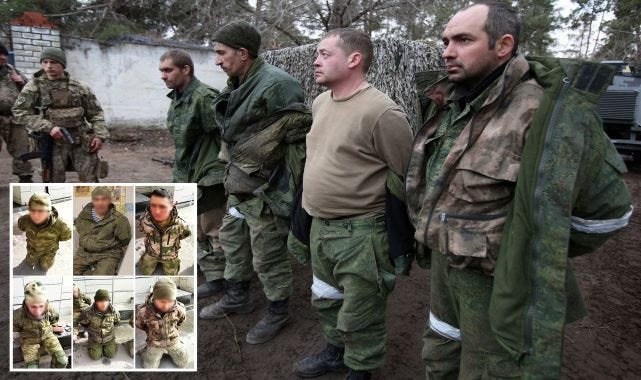 Ukrainian officials parade captured Russian soldiers ...