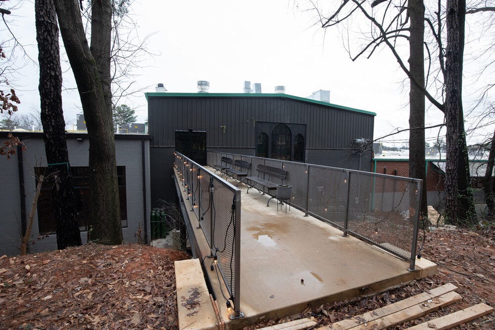 A walkway from the interior of Bold Monk Brewing Co. to the planned beer garden.