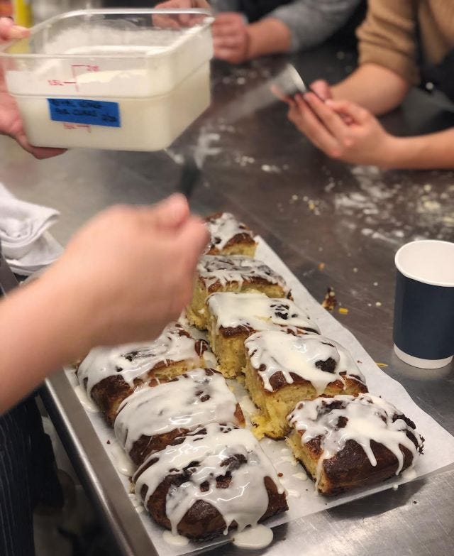 Icing warm cinnamon buns