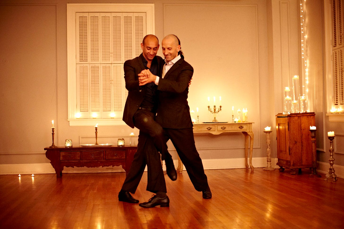 two men dancing tango