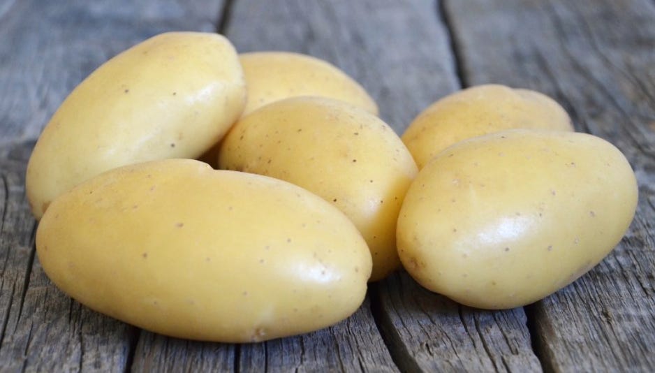 A potato variety with eyes that are not prominent.