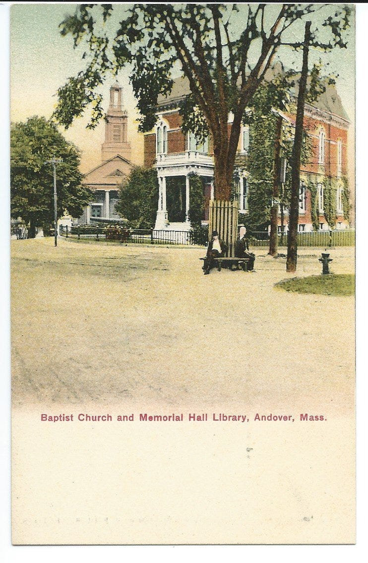 tintied postcard showing brick Italianate Memorial Hall Library with tree in front. Tree has fencing and bench with people. 