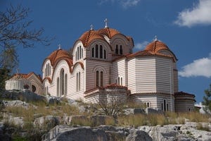 Church of Agia Marina on rocky hillside.jpg