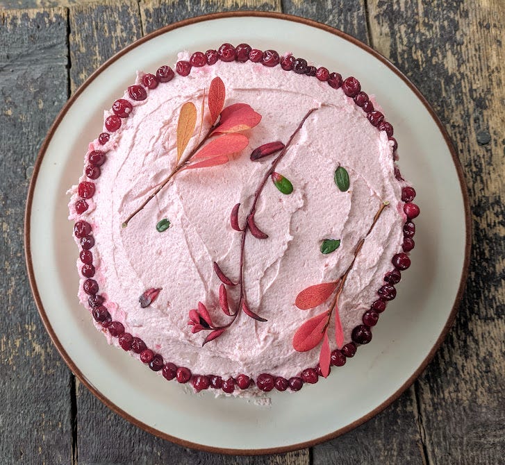 a pink lingonberry, rosehip and sparkling rose layer cake