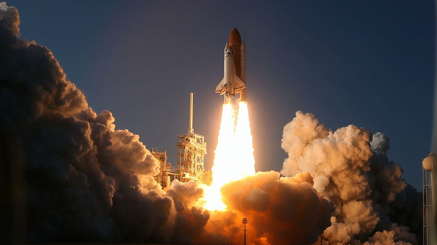 STS-133 lifts off from pad 39A at Kennedy Space Center