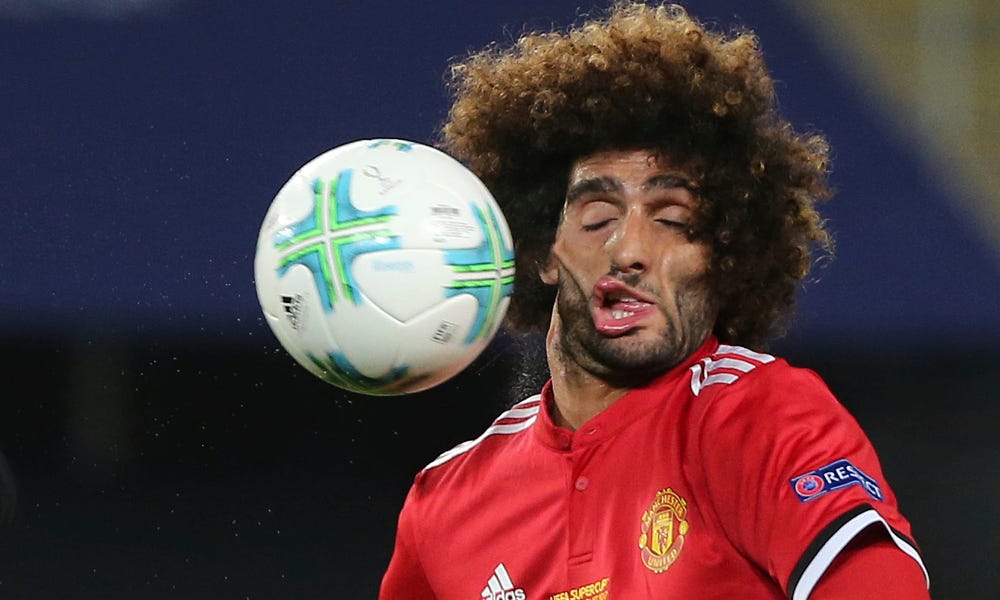 Manchester United's Marouane Fellaini roasted his own face-smashing soccer  photo | For The Win
