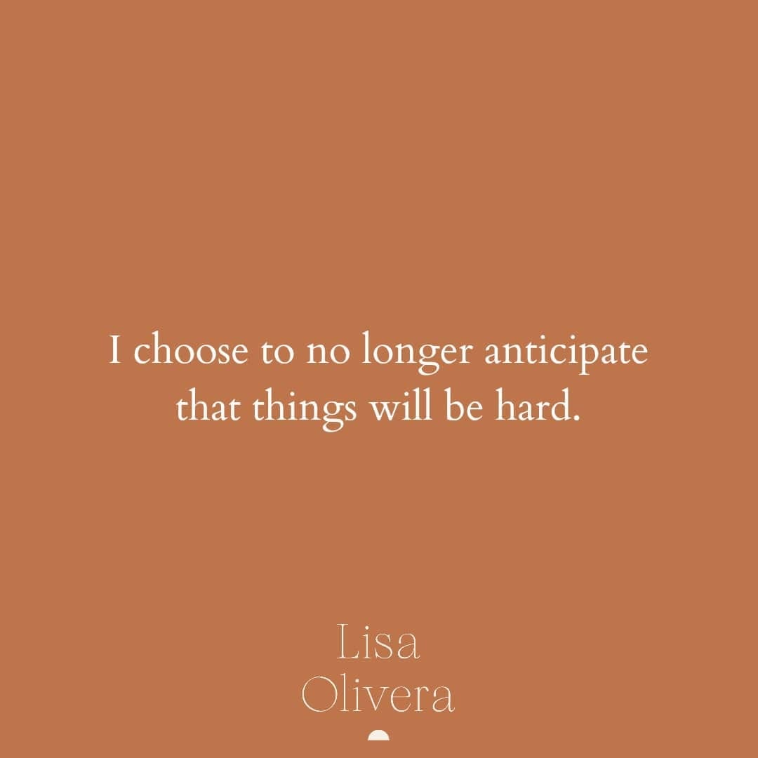 Clay red brown colored graphic with a white text quote in the middle of the page that reads, "I choose to no longer anticipate that things will be hard. - Lisa Olivera"