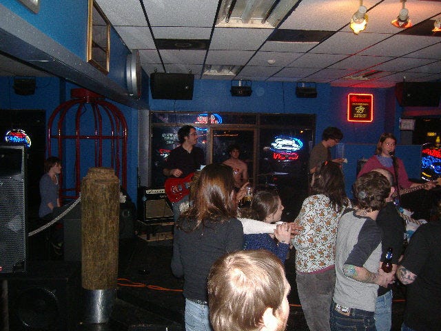 By the end of their set, there were cage dancers to stage right behind the pianist.