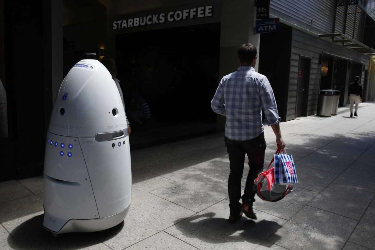 A Knightscope K5 autonomous security robot roams around the Stanford Shopping Center on June 15, 2016 in Palo Alto, Calif.