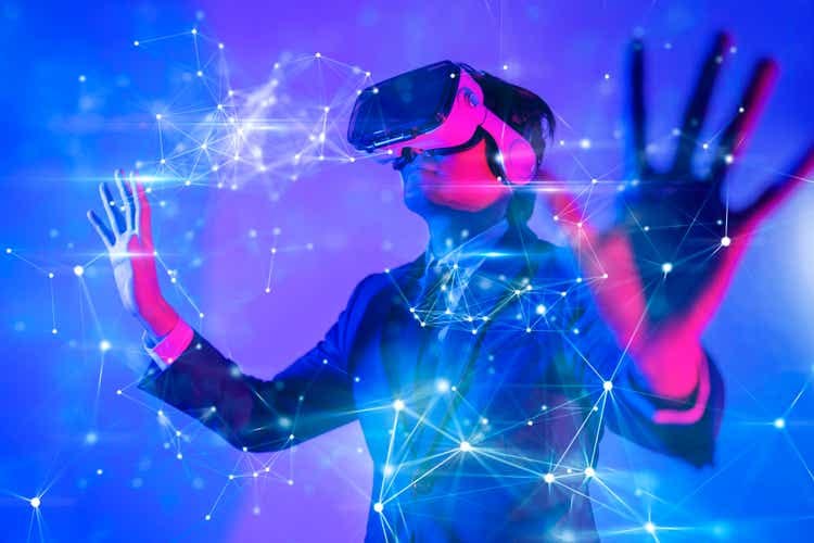 Metaverse digital cyber world technology, man with virtual reality VR goggle playing AR augmented reality game and entertainment, futuristic lifestyle