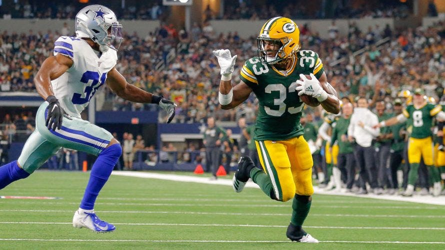 Aaron Jones fined for waving goodbye during touchdown run - ProFootballTalk