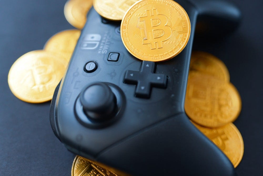 Gaming controller with virtual currency. Courtesy of olieman.eth on unsplash.com