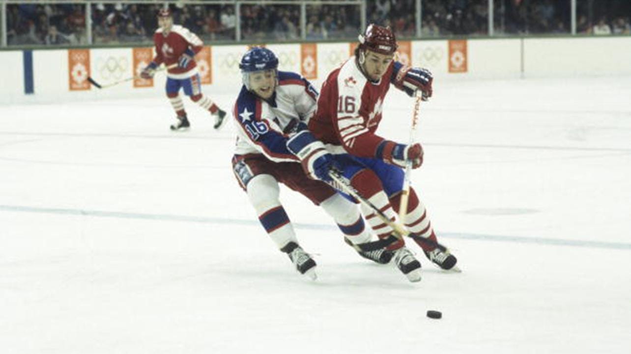 Hockey: 1984 Winter Olympics: USA Pat LaFontaine (16) in action vs Canada Kevin Dineen (16) during Men's Group B match at Olympic Hall Zetra. Sarajevo, Yugoslavia 2/7/1984 CREDIT: Ronald C. Modra (Photo by Ronald C. Modra /Sports Illustrated via Getty Images) (Set Number: X29598 TK1 )
