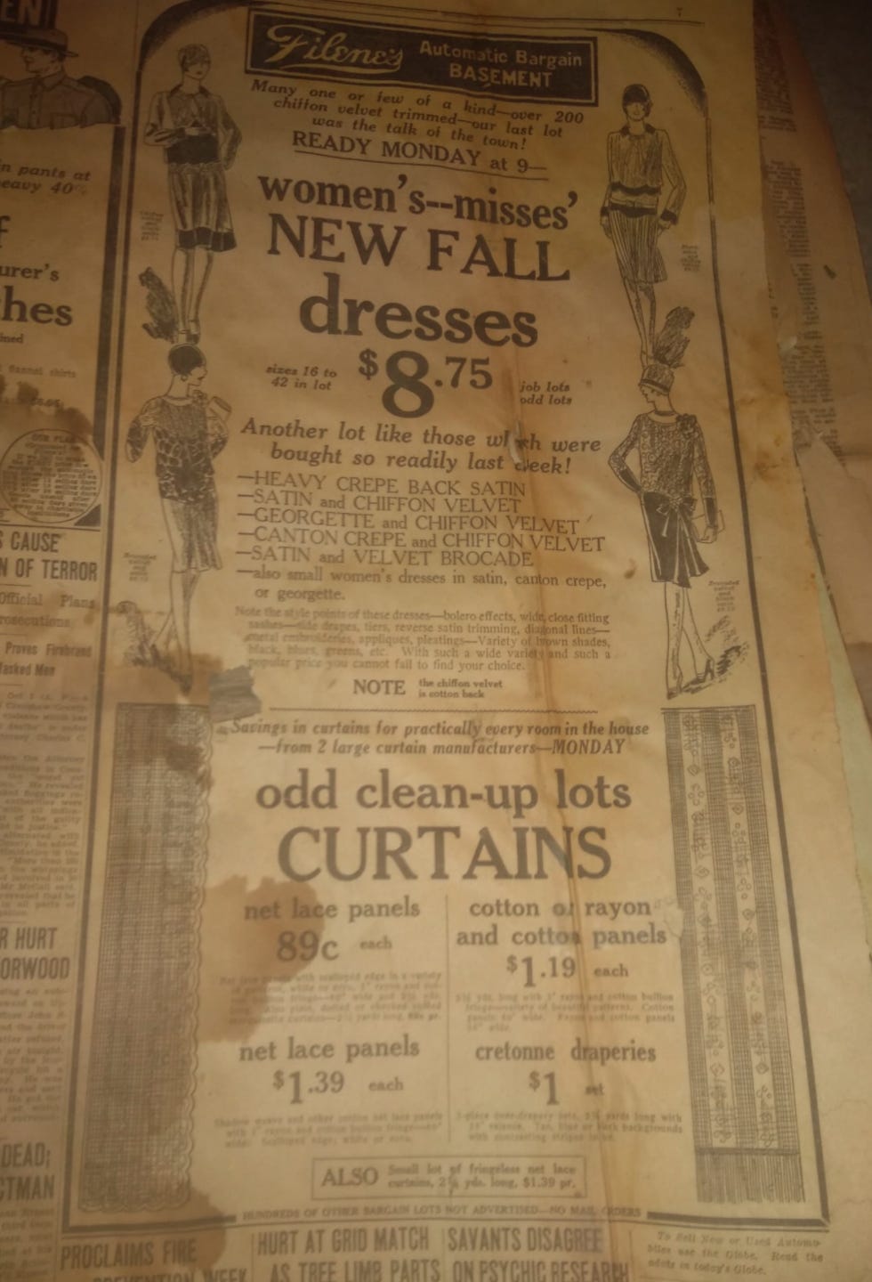 Image of old newspaper add for Filene's basement, featuring new dresses for women.